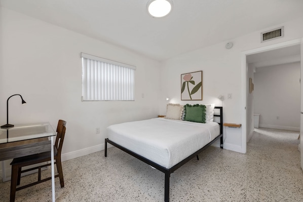 2 bedrooms, desk, laptop workspace, iron/ironing board