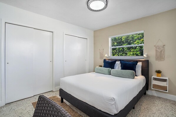 1 bedroom, desk, iron/ironing board, travel crib