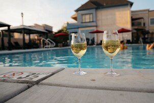 Outdoor pool, open 7:00 AM to 10:00 PM, sun loungers