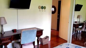 1 bedroom, desk, iron/ironing board, travel crib