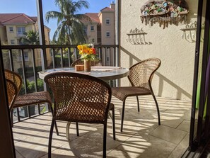 Enjoy a peaceful retreat with a balcony offering a serene view of the surrounding neighborhood.