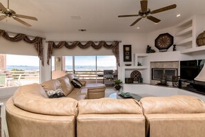 TV, fireplace, books, video library