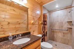 Shower, hair dryer, towels, toilet paper