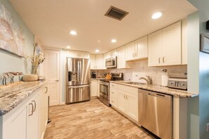 Fridge, microwave, oven, stovetop - Beautiful Hutchinson Island Condo - Steps to Ocean (Fort Pierce)