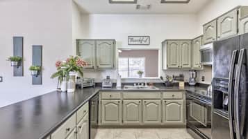 Luxury House | Private kitchen | Full-size fridge, microwave, oven, stovetop