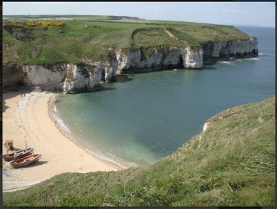Flamborough Rock House & Cottage - village centre location - sleeps 12