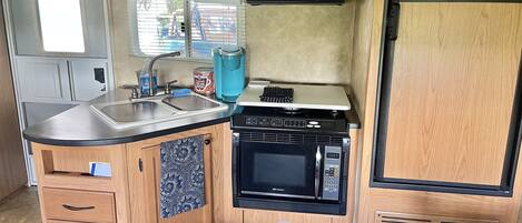 Microwave, coffee/tea maker, cookware/dishes/utensils