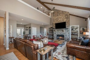 TV, fireplace, table football, books - Mountain Vista Alchemy | Private Asheville Mountain hHome w/ Hot Tub (Asheville)