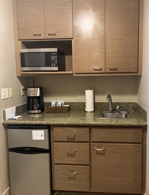 Fridge, microwave, coffee/tea maker, toaster