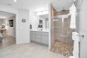 Shower, hair dryer, towels