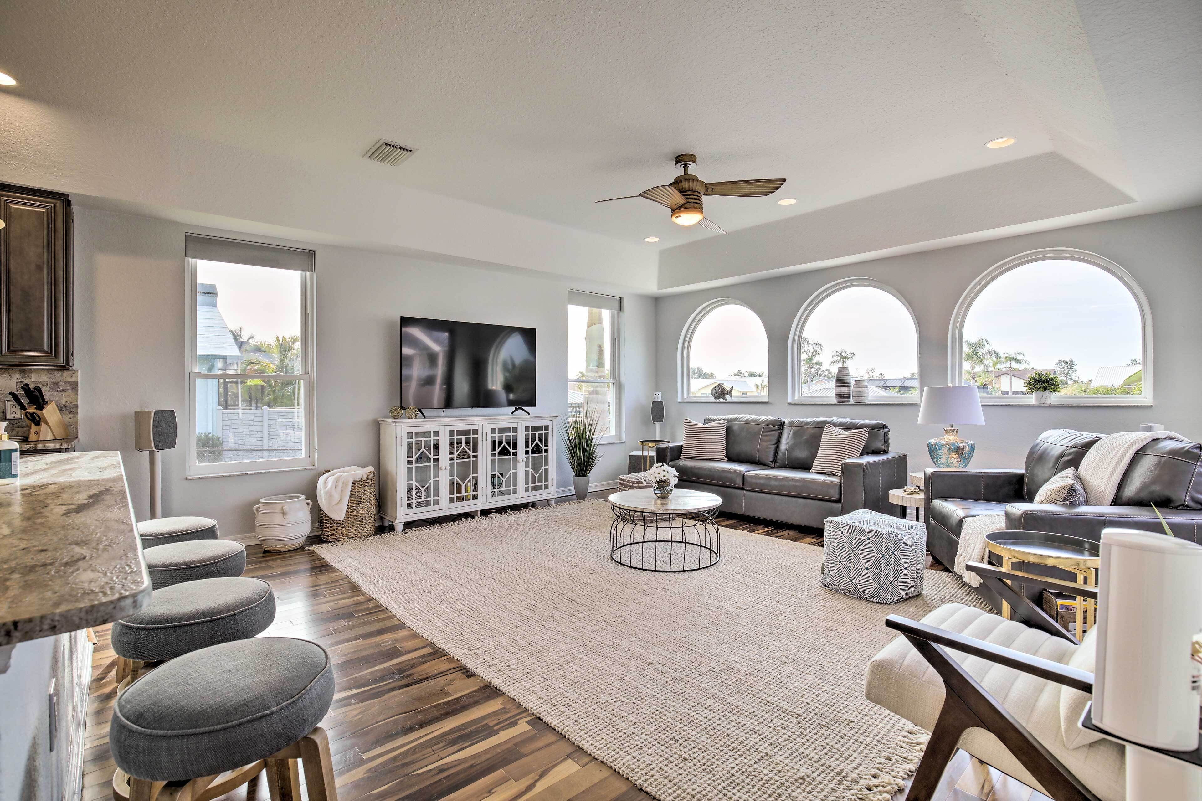 Elegant Waterfront Oasis: Heated Pool, Spa & Dock!