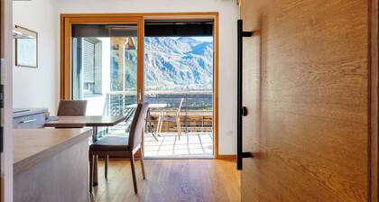 Appartement moderne "3 Weger" avec vue panoramique sur les montagnes, beau balcon et Wi-Fi