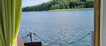 Raft 'Priepert 2' on the Mecklenburg Lake District with Covered Terrace