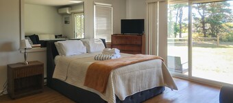 Cozy, Ground-Floor Getaway w/ Free WiFi, a Kitchen, Shared Pool, & Private Patio