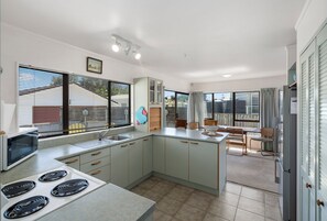Fridge, microwave, toaster, cookware/dishes/utensils