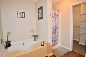Combined shower/tub, hair dryer, towels, soap