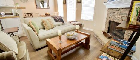 Smart TV, fireplace, books, offices