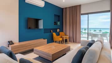 Departamento, 2 habitaciones | Área de sala de estar | Televisión LED