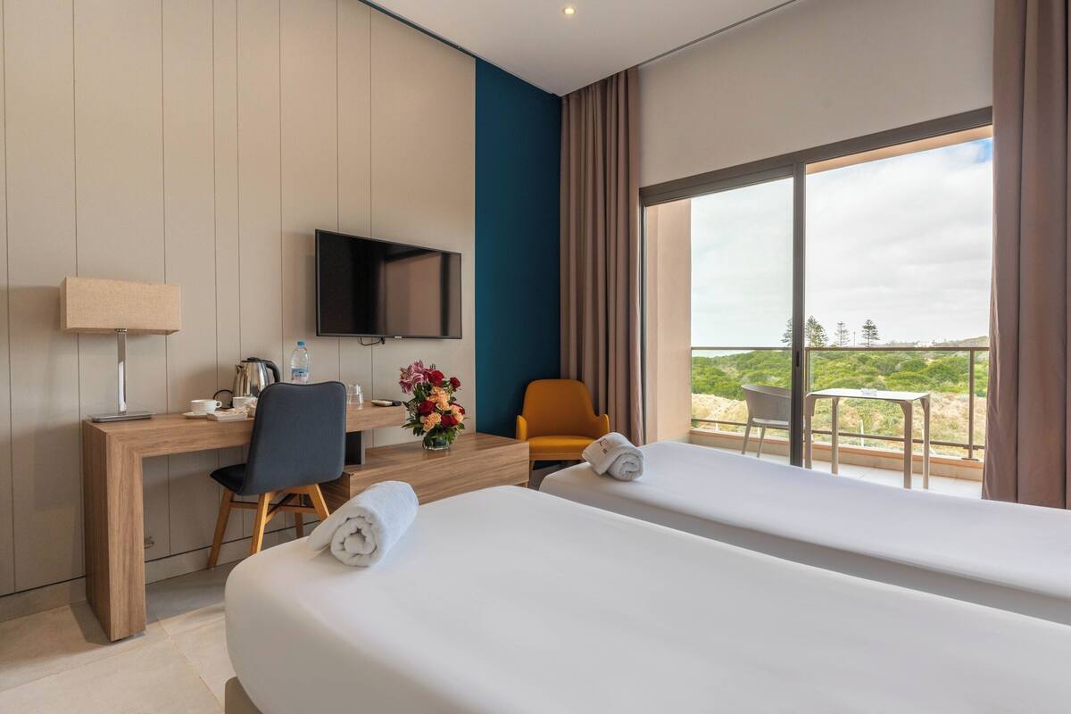 Standaard Twin kamer | Luxe beddengoed, een minibar, een kluis op de kamer, geluiddichte muren