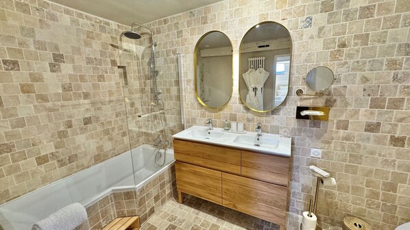 Shower, eco-friendly toiletries, hair dryer, towels