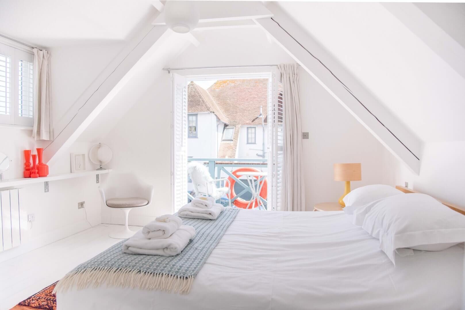 2 bedrooms, laptop workspace, iron/ironing board, travel cot