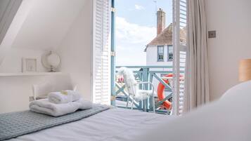 2 bedrooms, laptop workspace, iron/ironing board, travel cot