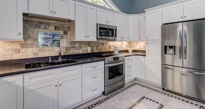 Pet Friendly | 5000 Sq Ft | 2 Living Rooms & 2 Kitchens | Optional Pool Heat | Firepit | Fenced Yard