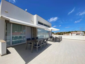 Outdoor dining - Wonderful modern, spacious and comfortable villa (Fornells)