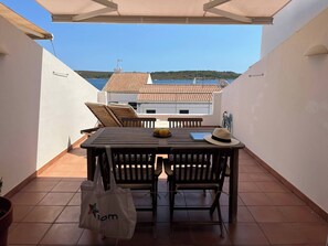 Outdoor dining - In a very quiet area within the town (Fornells)