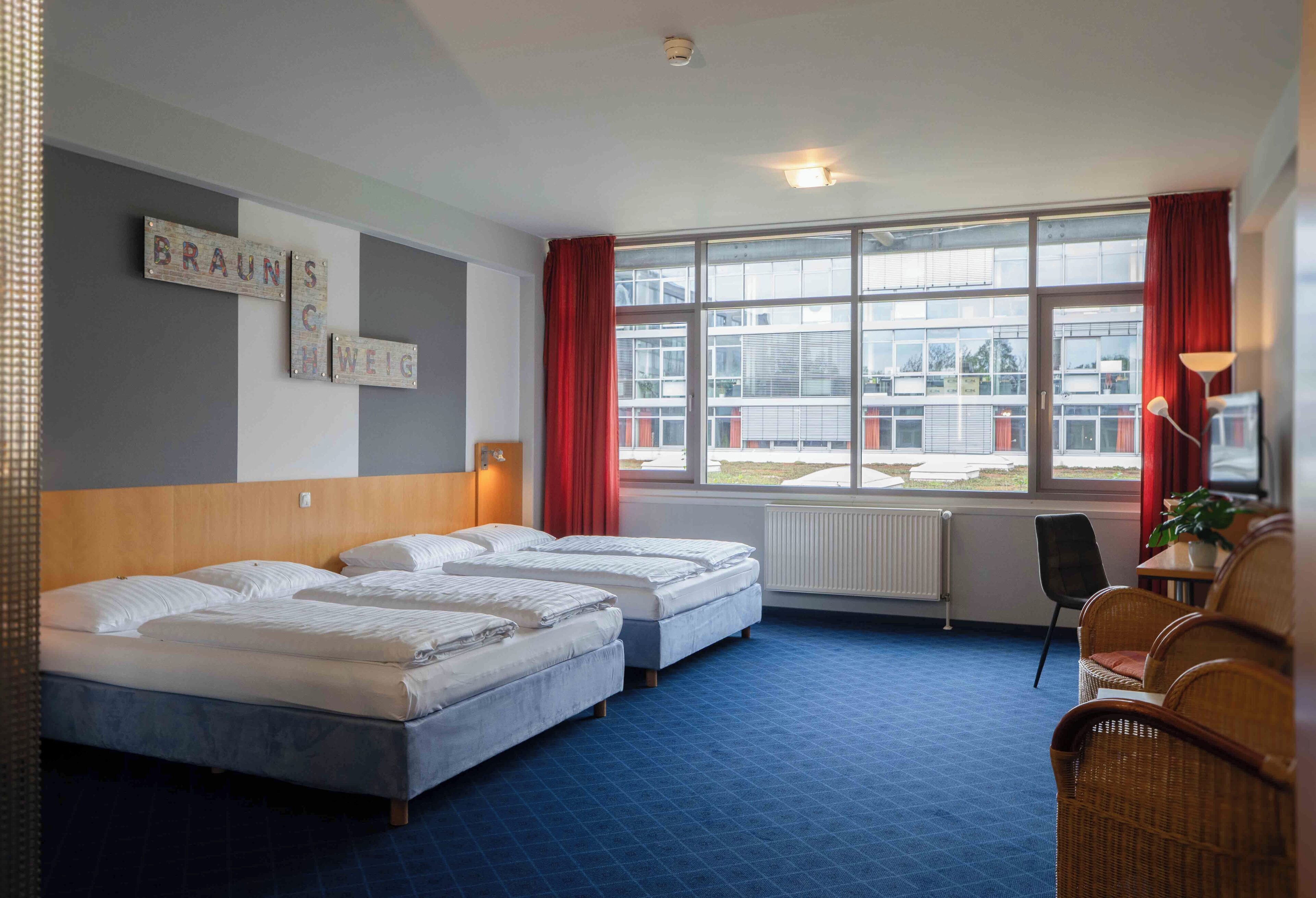 Family Triple Room, Non Smoking | Hypo-allergenic bedding, desk, laptop workspace, iron/ironing board