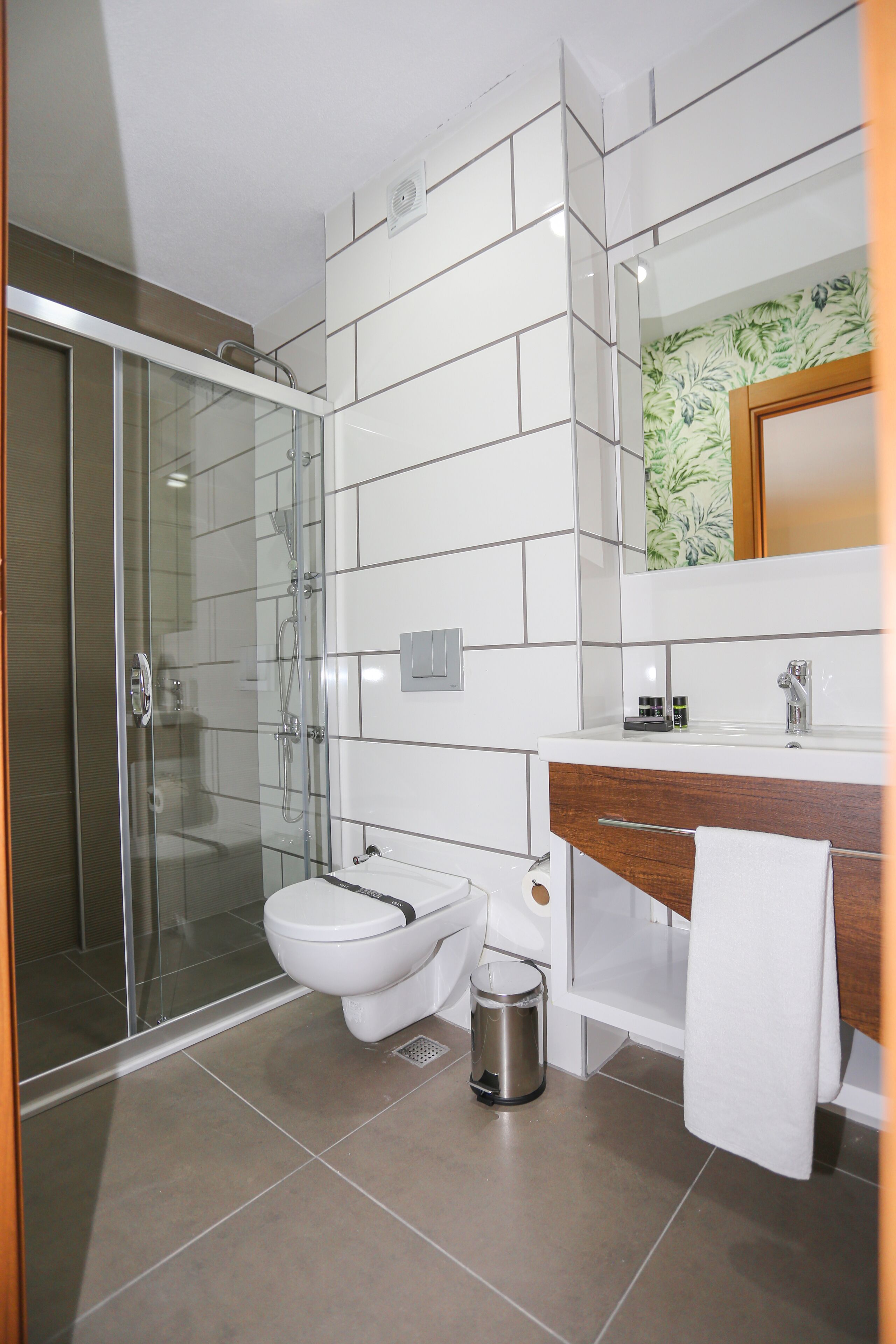 rainfall showerhead, free toiletries, hair dryer, bathrobes