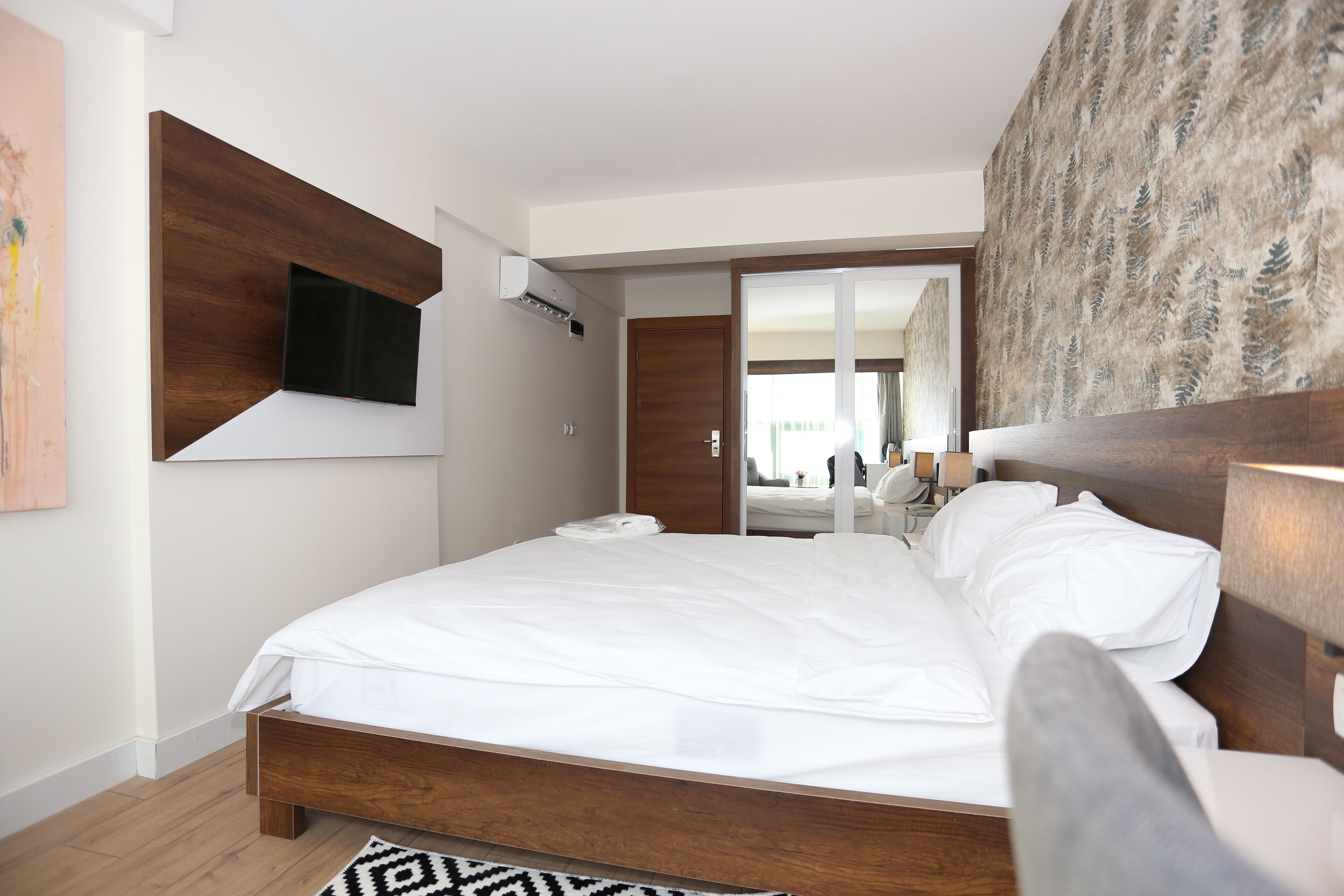 deluxe double room, 1 queen bed | premium bedding, minibar, desk, laptop workspace
