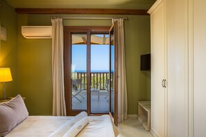 2 dormitorios, caja fuerte, tabla de planchar con plancha