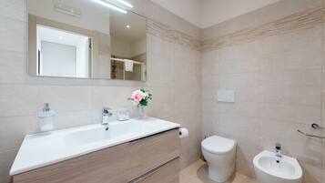 Family Apartment, Multiple Bedrooms (La Suite 2 Ondina Viareggio 200m from) | Bathroom | Shower, hair dryer, bidet, towels