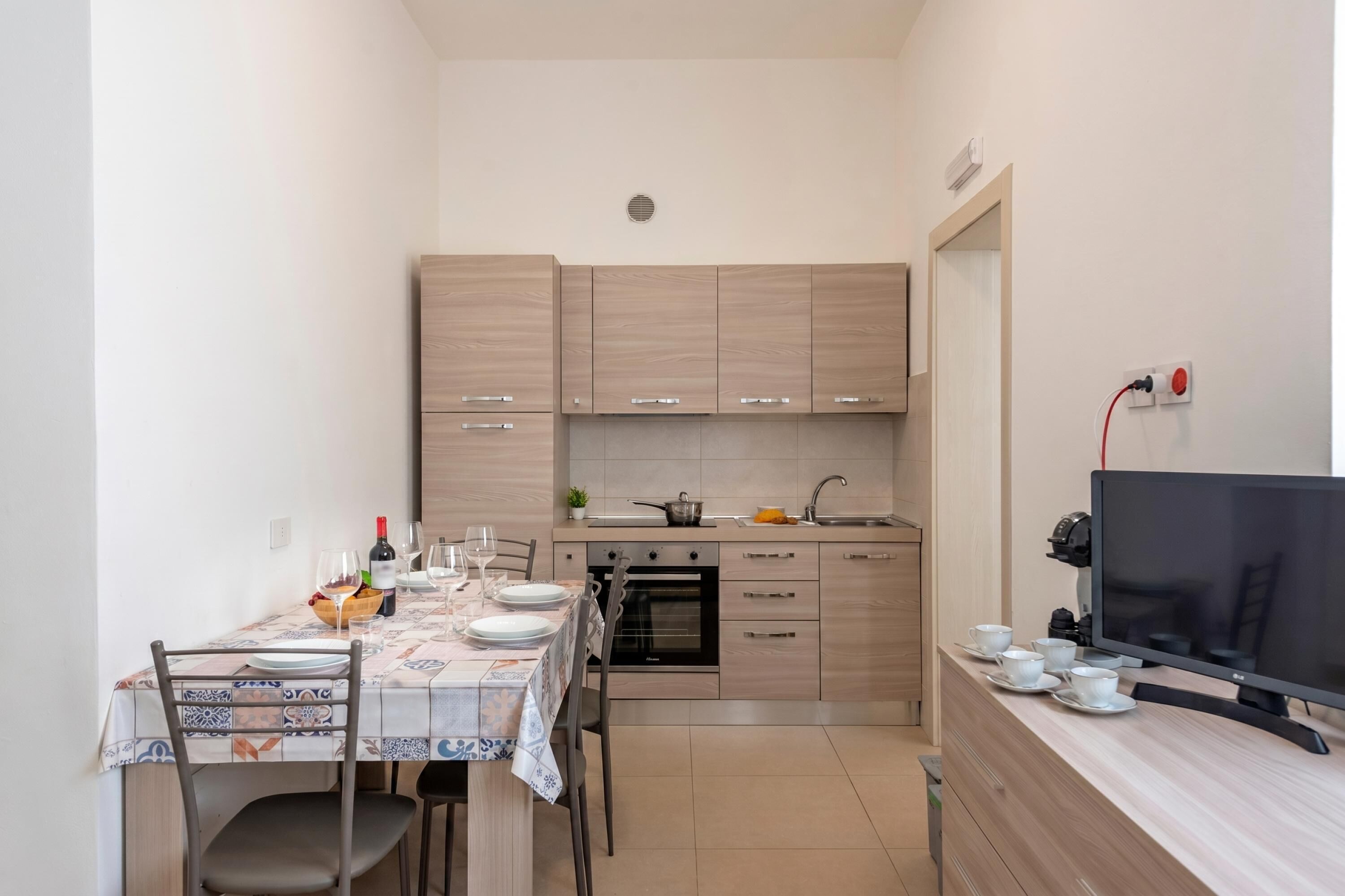 Family Apartment, Multiple Bedrooms (La Suite 2 Ondina Viareggio 200m from) | Private kitchen | Fridge, oven, stovetop, coffee/tea maker