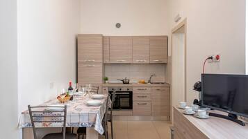 Family Apartment, Multiple Bedrooms (La Suite 2 Ondina Viareggio 200m from) | Private kitchen | Fridge, oven, stovetop, coffee/tea maker