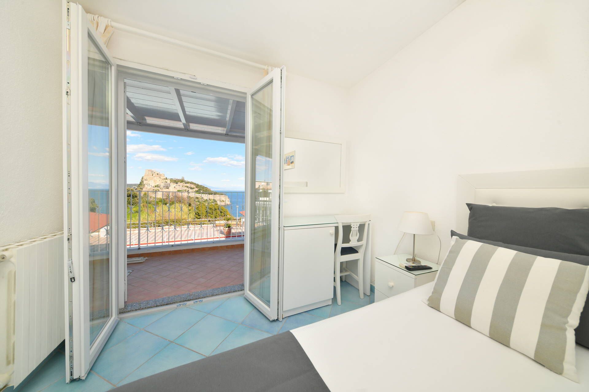 Superior Double Room, Partial Sea View | Desk, iron/ironing board, free WiFi, bed sheets