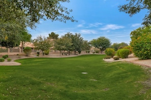 Property grounds - Newly meticulously remodeled 4 bedroom, 2 bath home with green belt view. (Chandler)