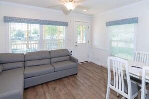 Cottage | Living room | 24-inch flat-screen TV with cable channels, TV - Sun Retreats Silver Lake (Mears)