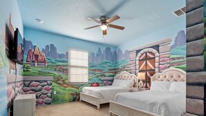 A bedroom with two beds, a ceiling fan, a window with blinds, and a mural on the walls. - Waterpark, Caribbean Backyard, Epic Game Room w/ Pool Table: Florida Dreamin (Davenport)
