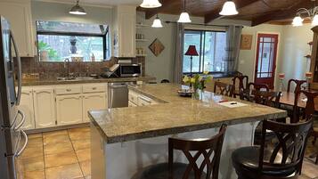 Coffee/tea maker, fridge, microwave, oven