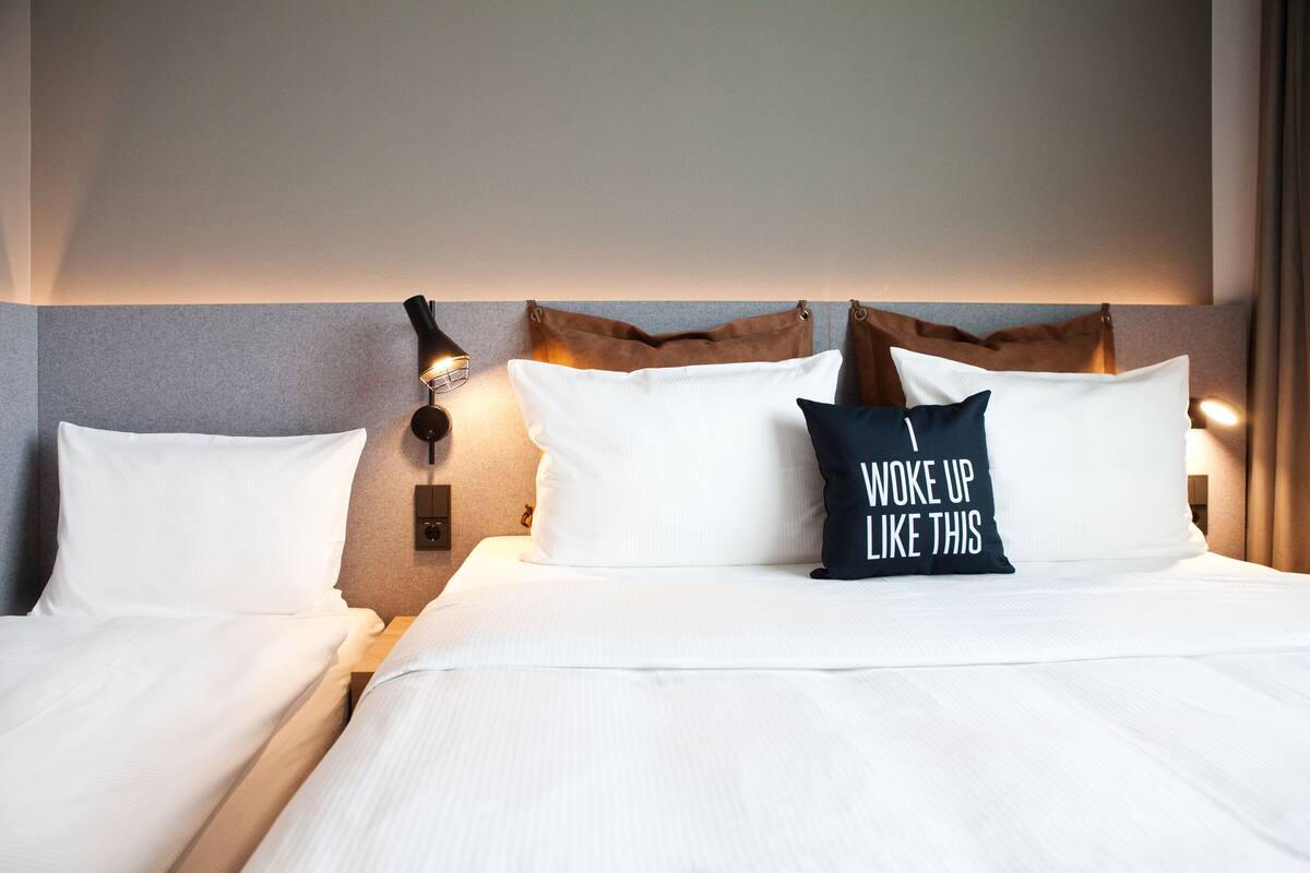 room, 1 queen bed with sofa bed | living area | 49-inch flat-screen tv with cable channels, tv