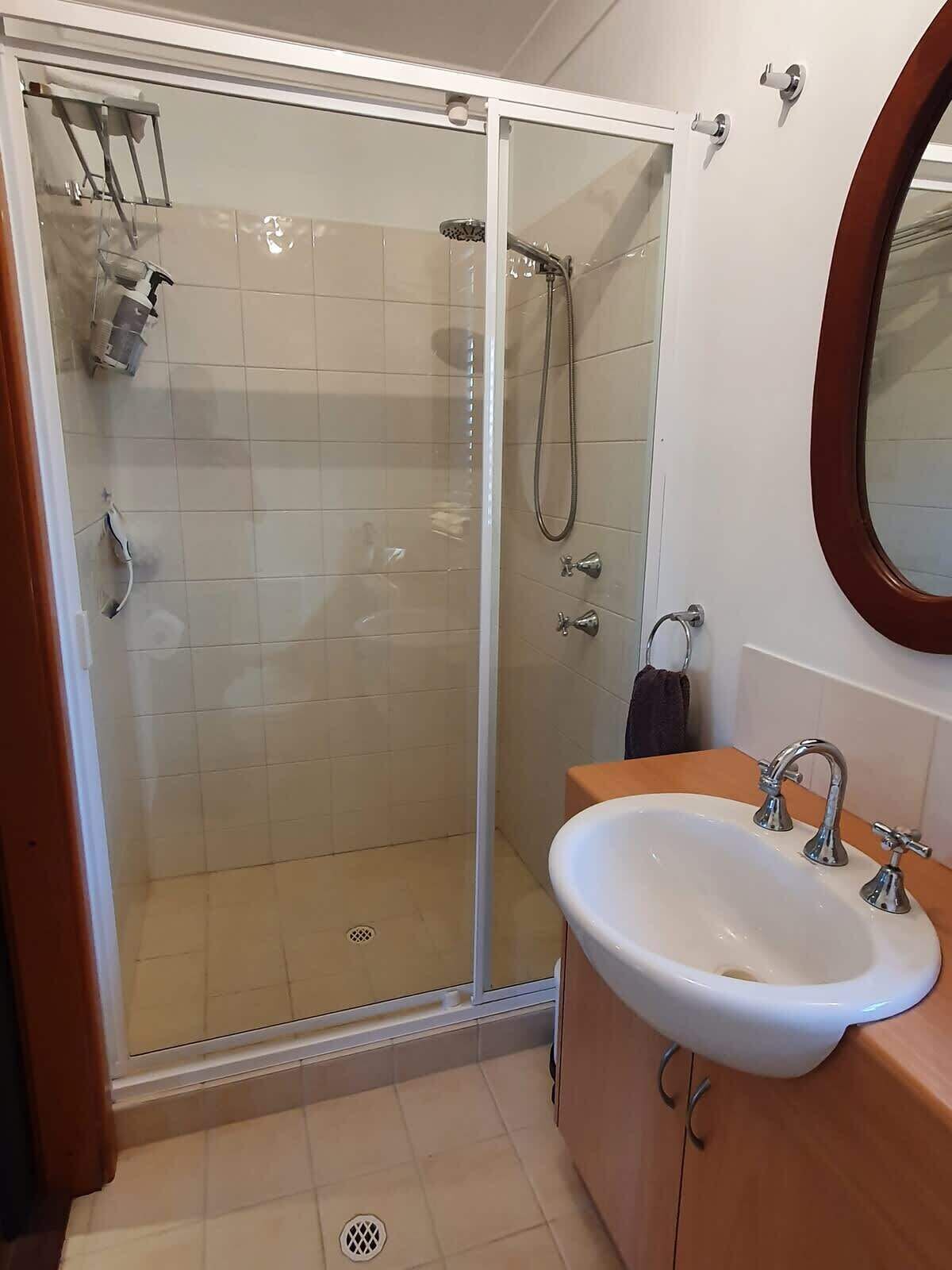 Shower, eco-friendly toiletries, hair dryer, towels
