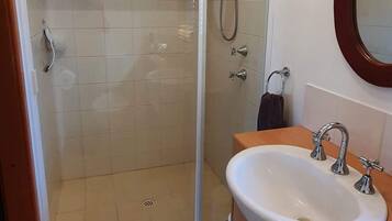 Shower, eco-friendly toiletries, hair dryer, towels