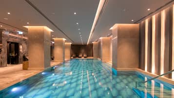 Indoor pool, seasonal outdoor pool, pool umbrellas, pool loungers