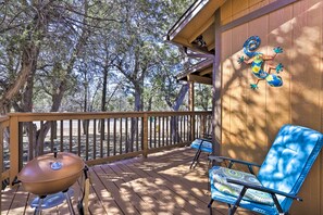 Enjoy al fresco dining on the deck with a barbecue grill and comfortable seating.
