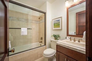 Bathtub, hair dryer, towels