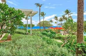 Property grounds - Maui Resort Rentals: Honua Kai – 6 Total Bedrooms, Groundfloor Residences, Over 3500 Combined Sq. Ft., Large Lawn Areas, Steps to Pools/Beach/B.B.Q.s! (Lahaina)