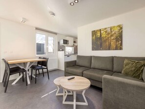 Chalet | Living room | TV - Cozy Chalet w/ Pool Access (Gasselternijveen)