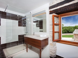 Bathtub, hair dryer, towels